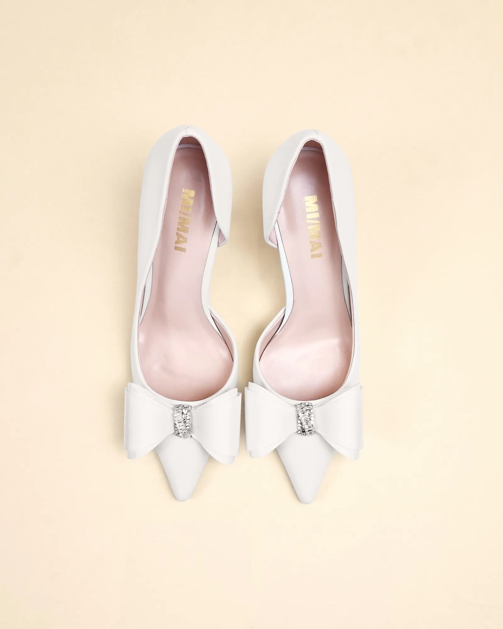 Escarpins blancs à bout pointu ornement noeud et strass Iris White Leather