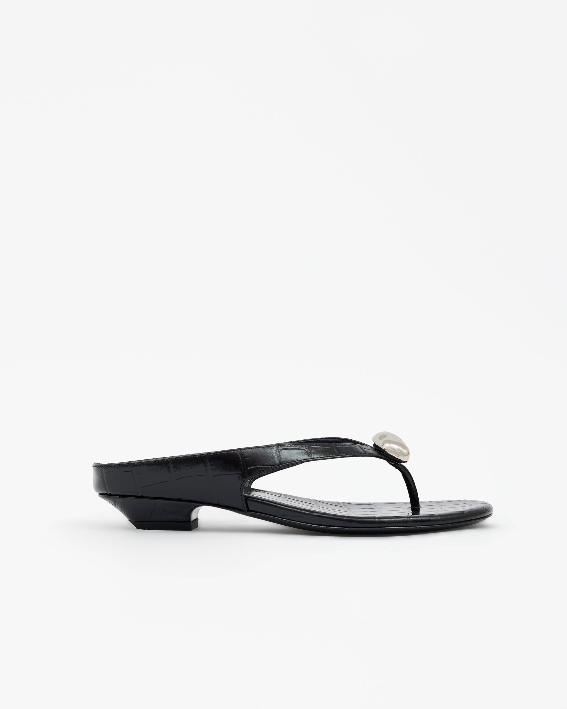 Eero Black flat mule with wide black leather strap