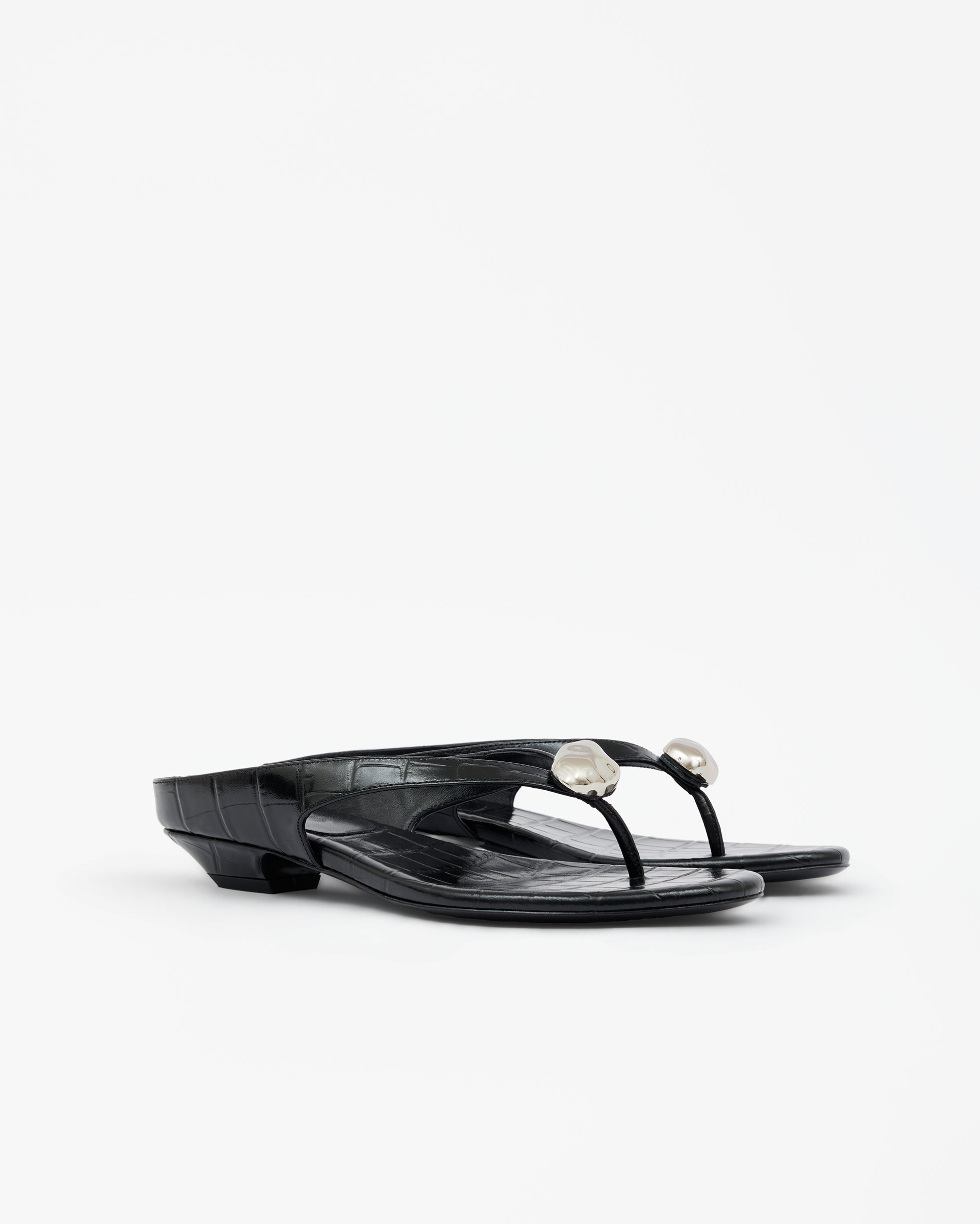 Eero Black flat mule with wide black leather strap