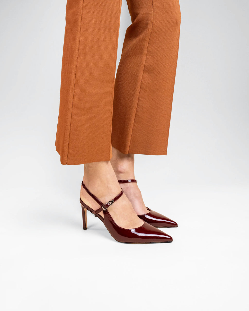 Emy Burgundy Patent pointed-toe slingback pump with burgundy patent leather strap