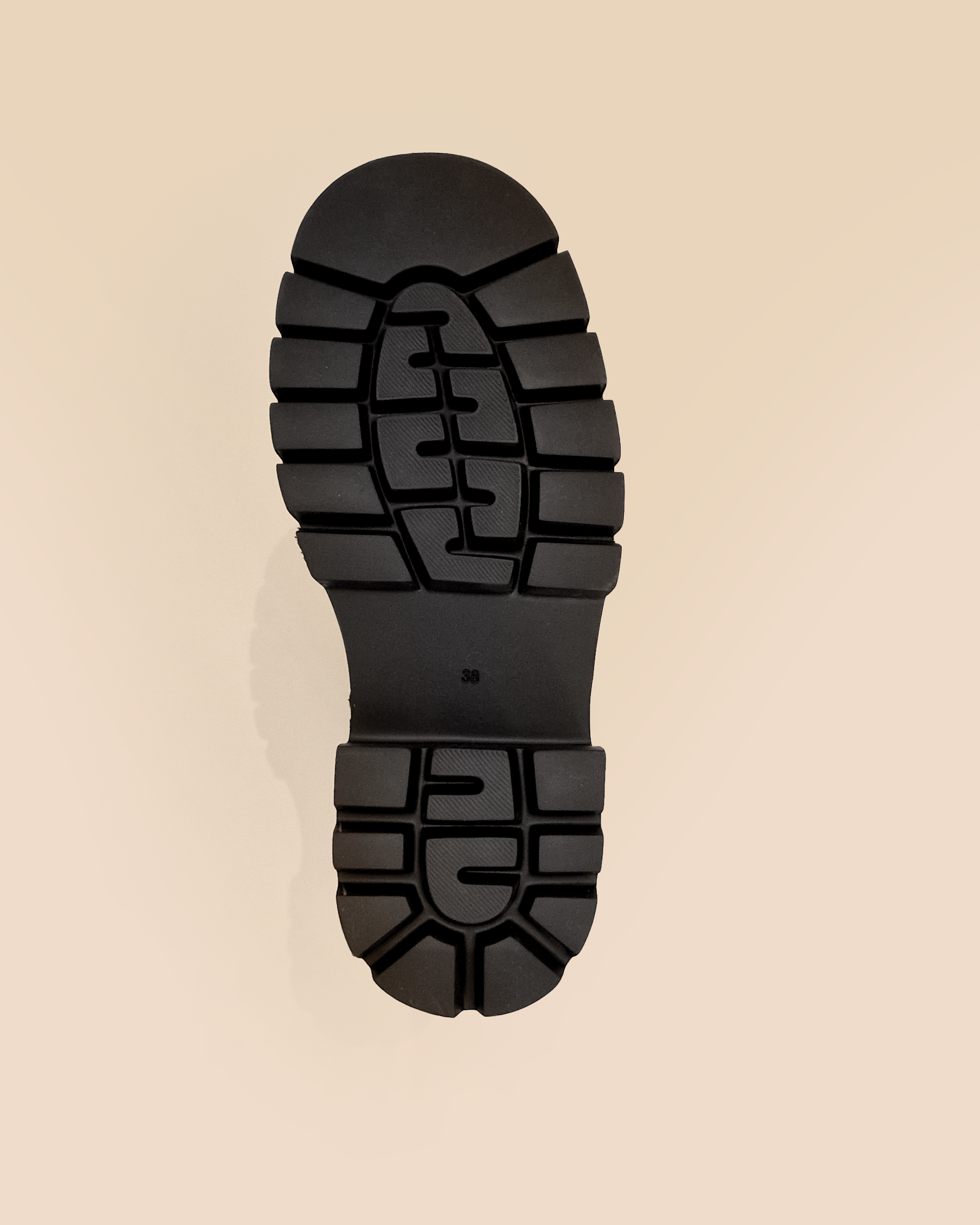 BOTTES NOIRES A SEMELLE CHUNKY CRANTEE EN CUIR HERPEN BLACK