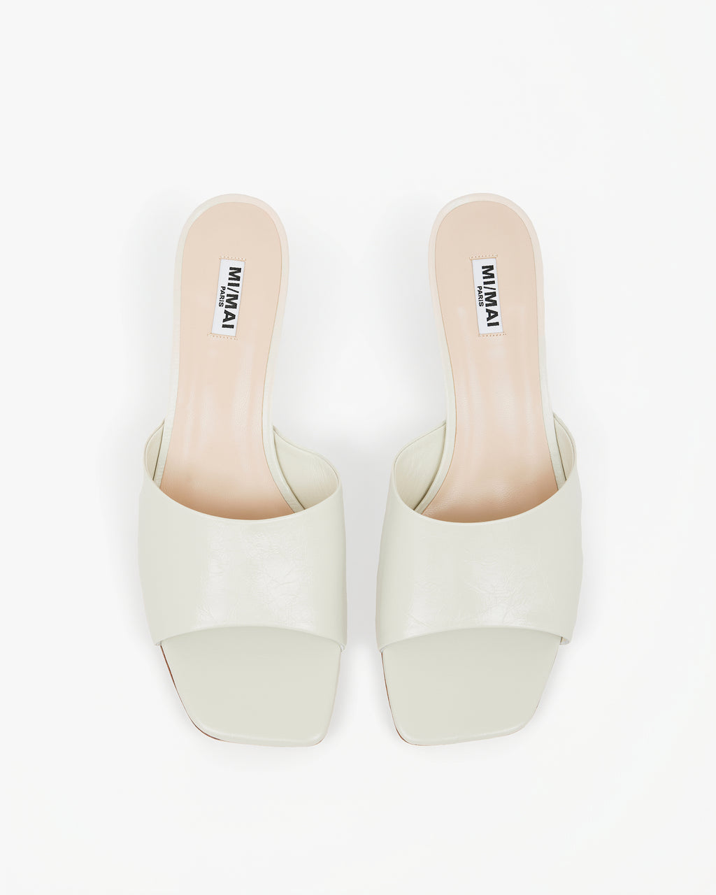 Mule en cuir glossy blanc à talon bas Liz White