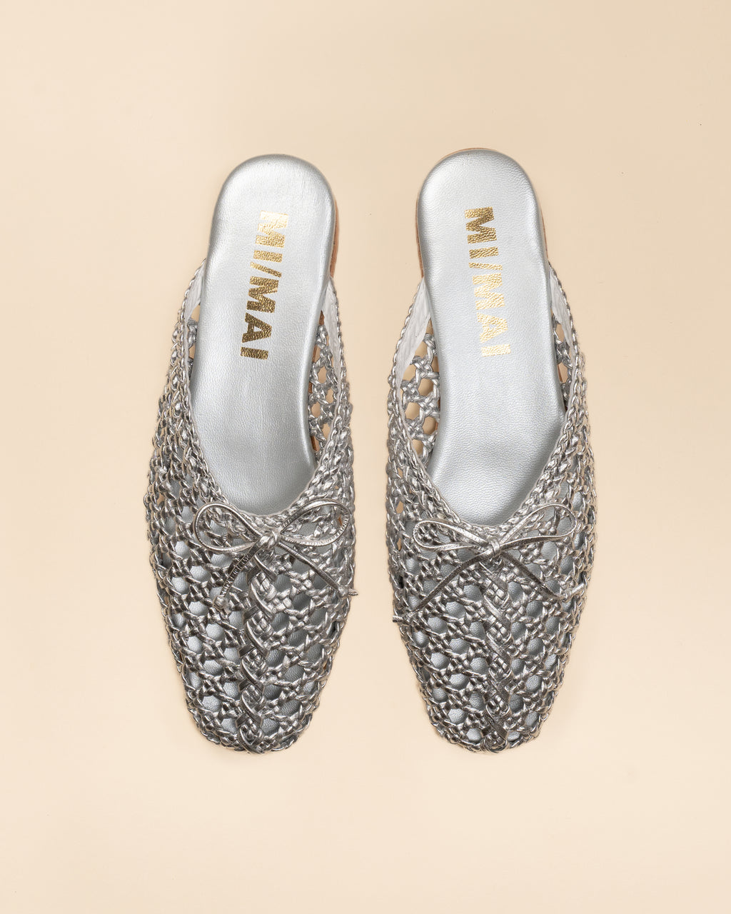 Mules plates en cuir tressé doré Lucian Silver
