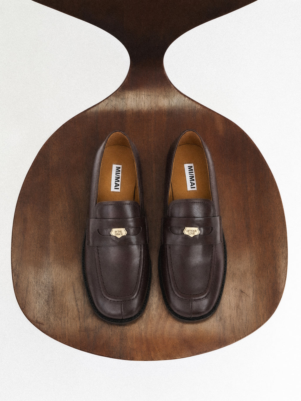 LUCIANO PENNY BLACK LEATHER MOCCASINS