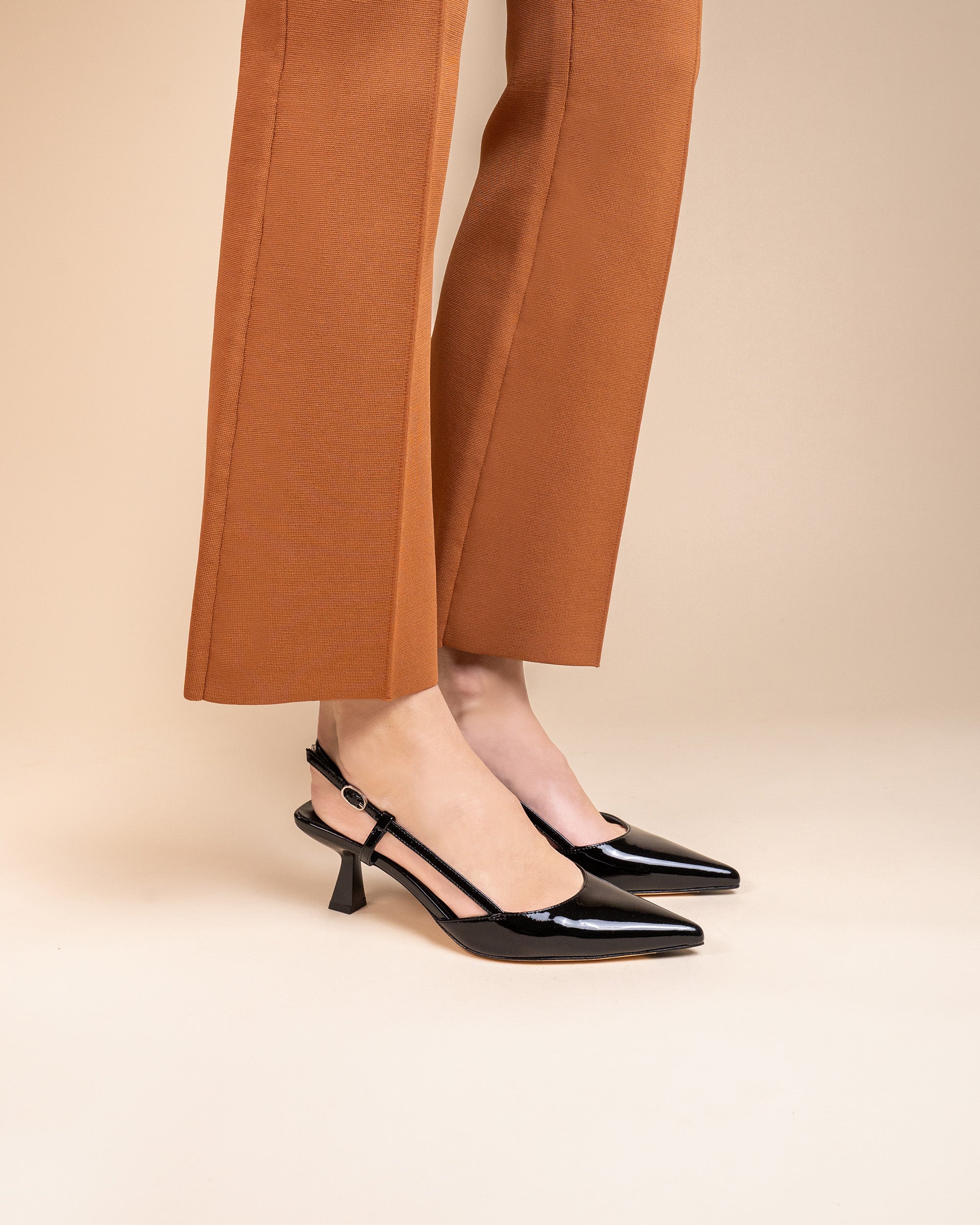 Corto Black Mirror black patent leather slingback pump with a low heel