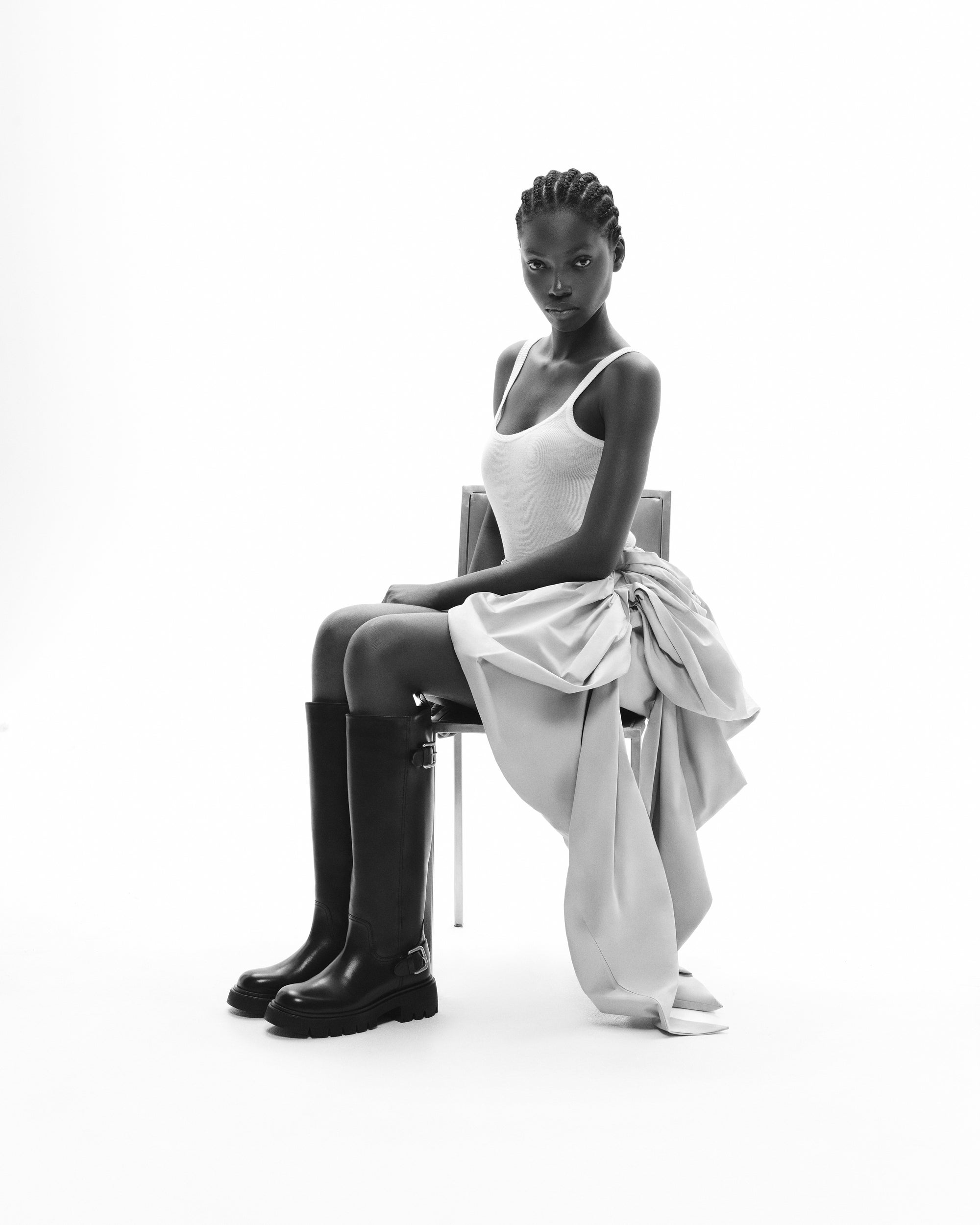 BOTTES NOIRES A SEMELLE CHUNKY CRANTEE EN CUIR HERPEN BLACK