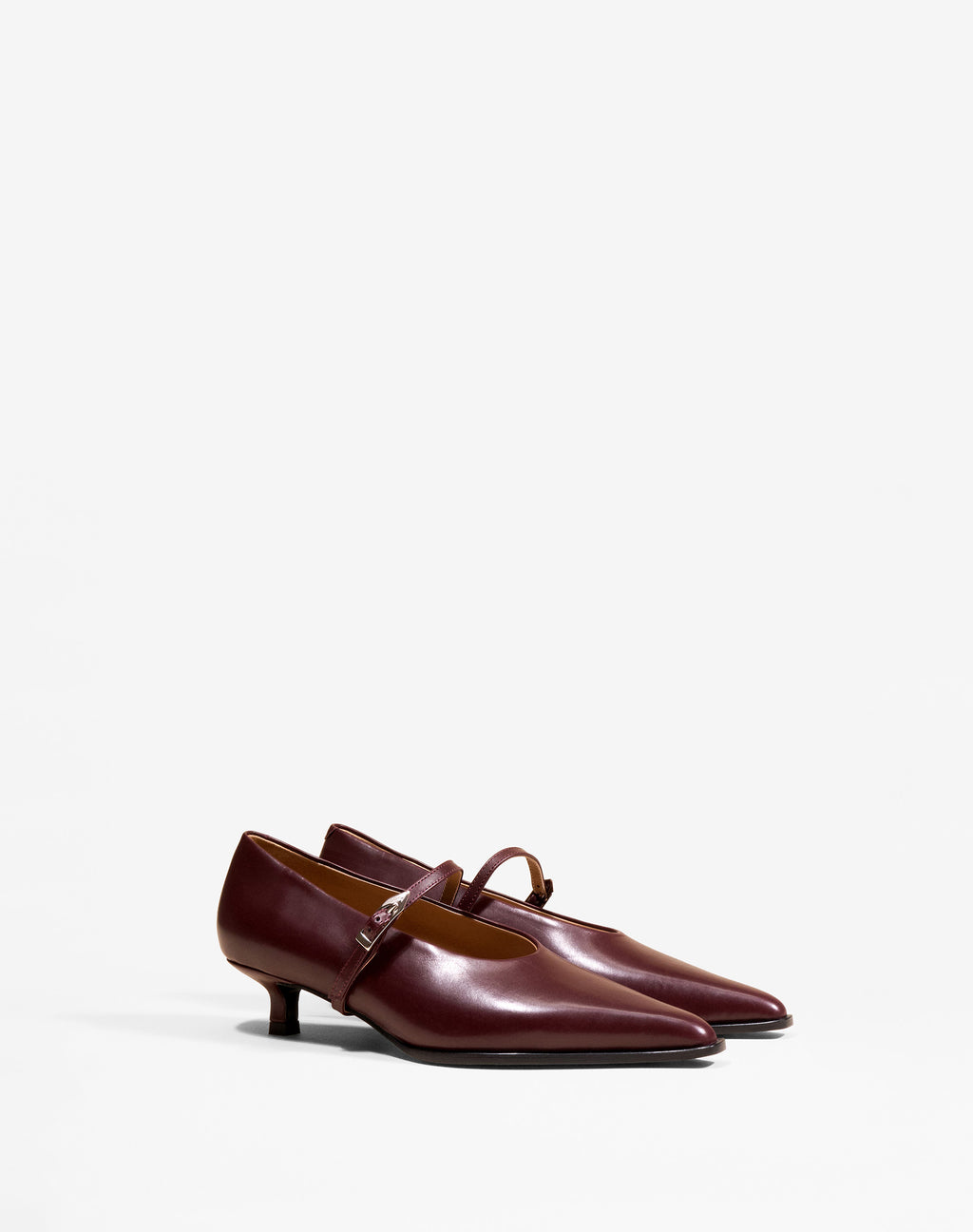 Renzo Burgundy pointed-toe pump with a small spool heel in burgundy leather