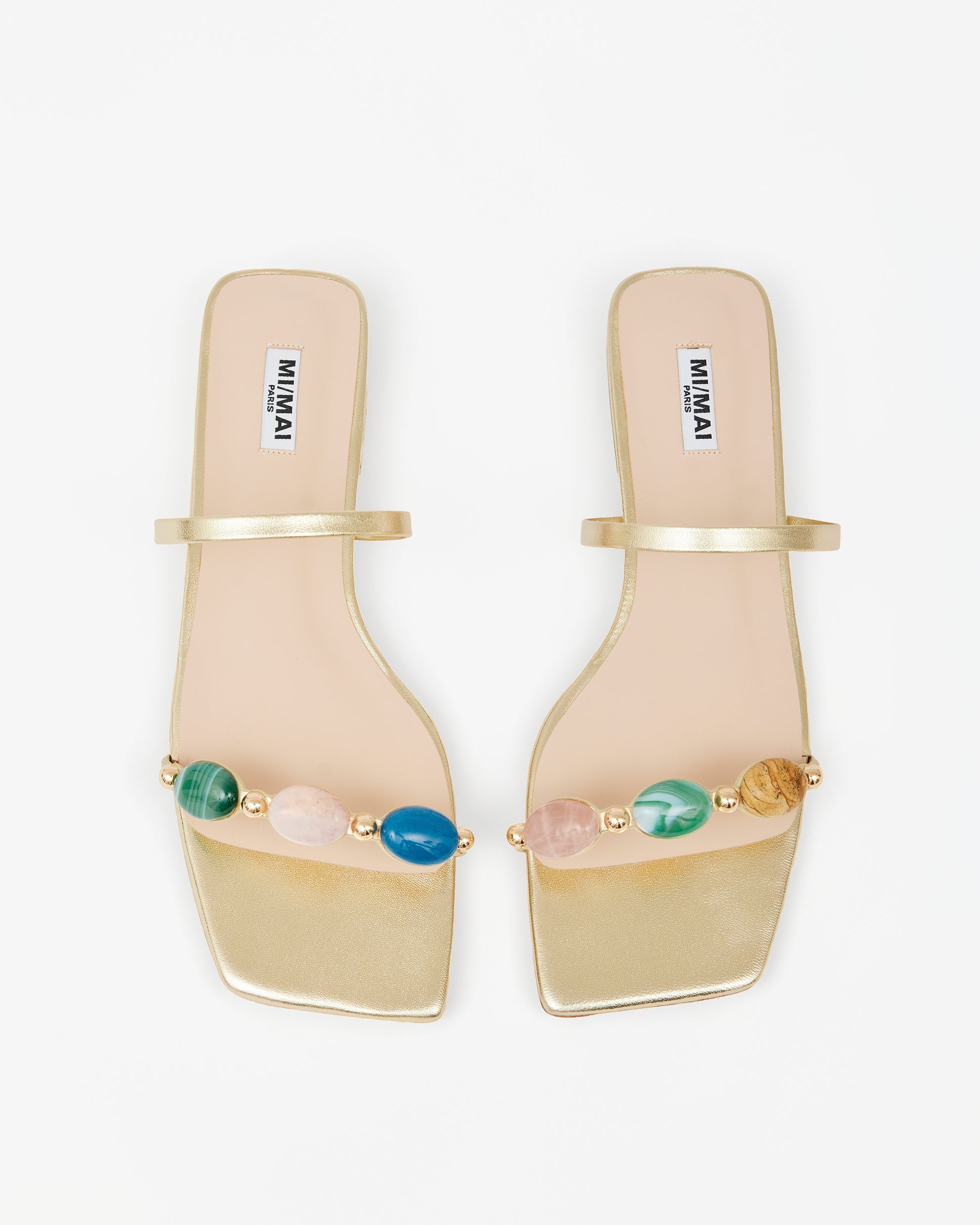 Eero Black flat mule with wide black leather strap