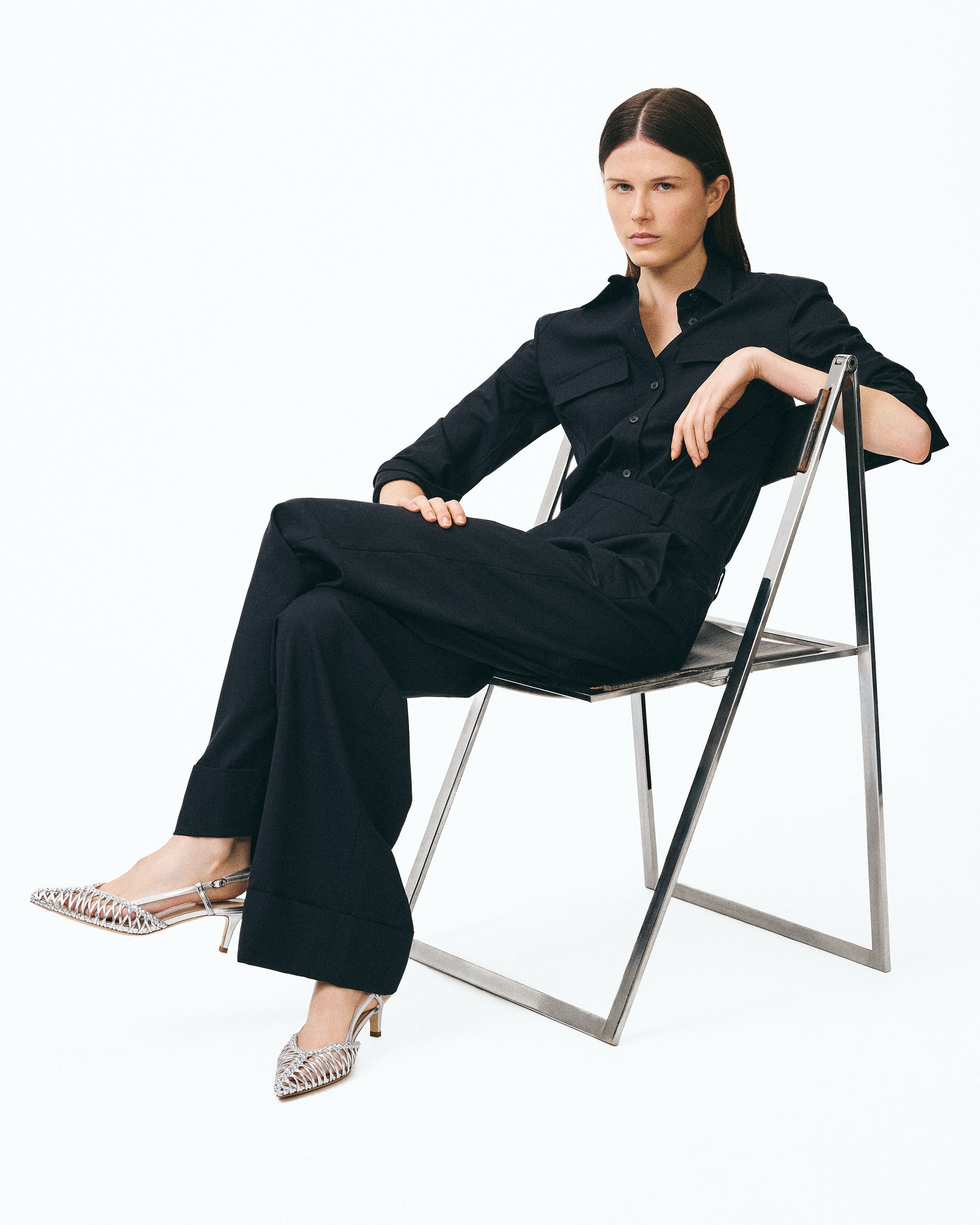 Renzo Black pointed-toe pump with ankle strap and small spool heel