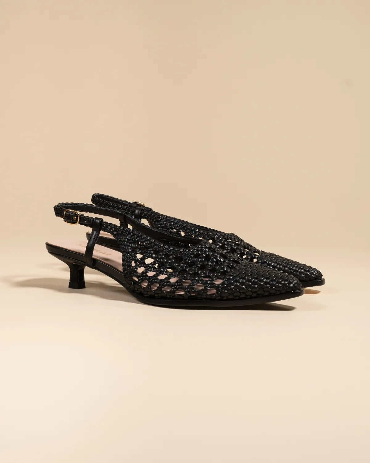 Marina Woven Black woven faux leather slingback pump with a small spool heel