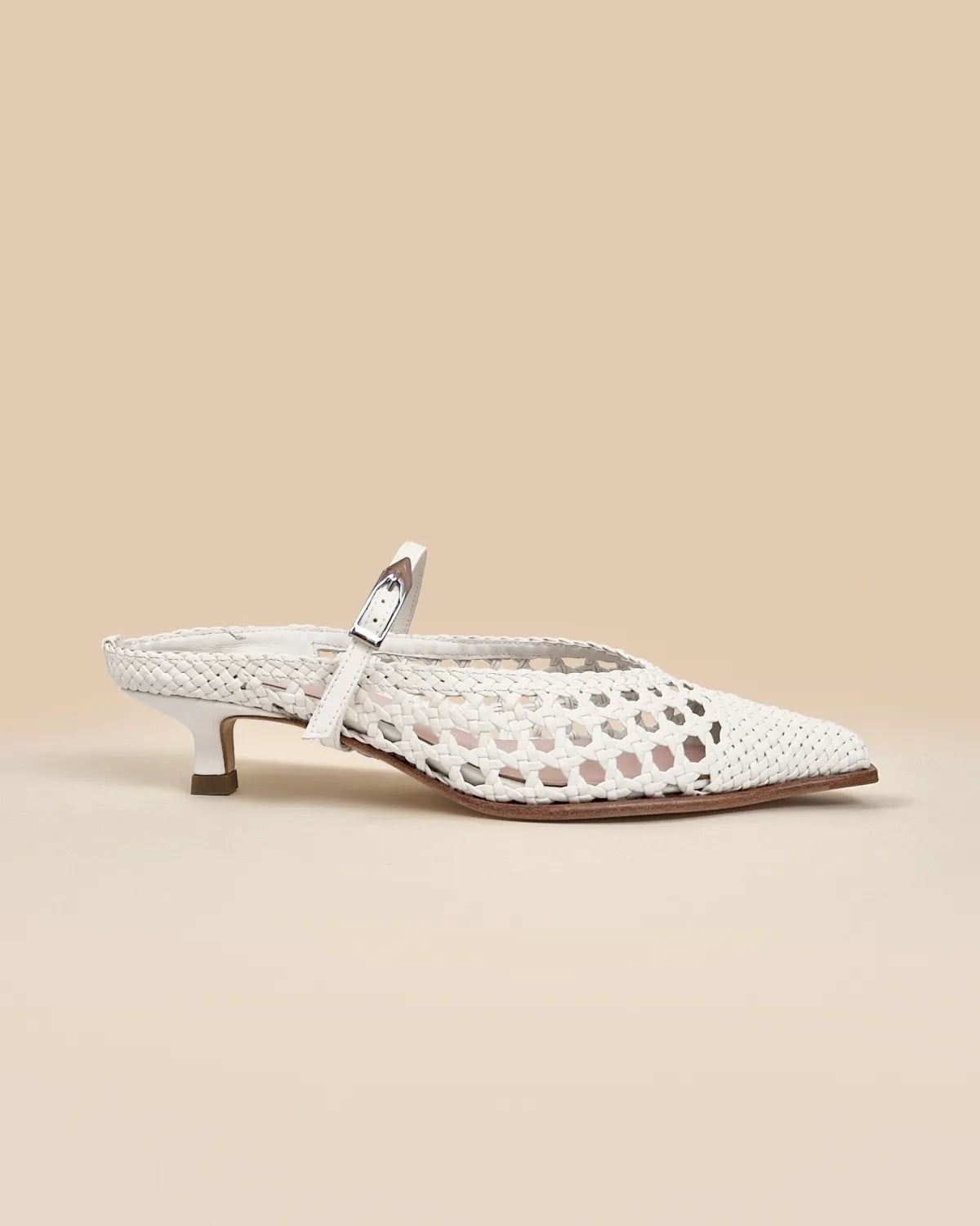 Pointed toe mule pump with small spool heel in white woven faux leather Suzanne Woven White