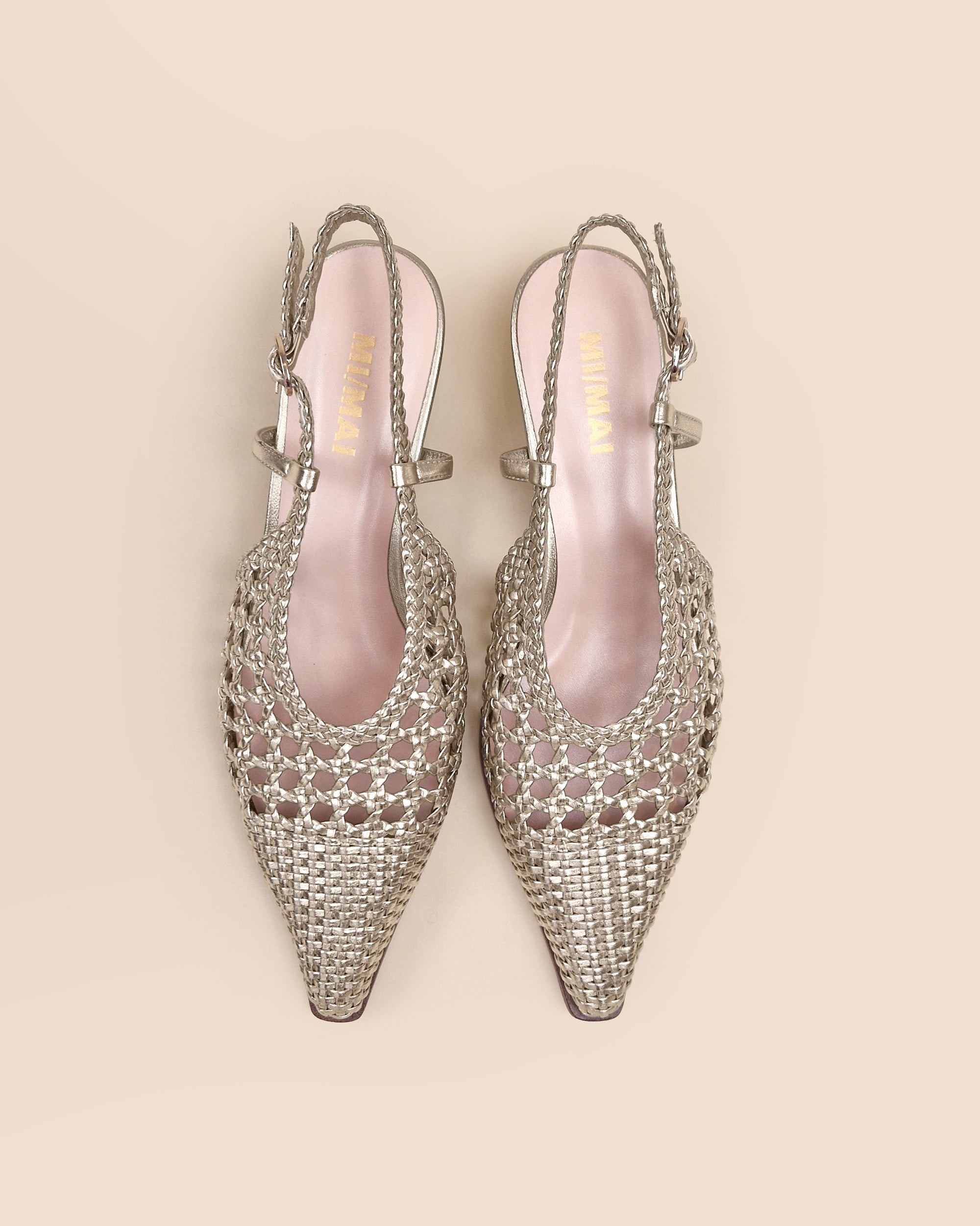 Marina Woven Gold woven faux leather slingback pump with a small spool heel