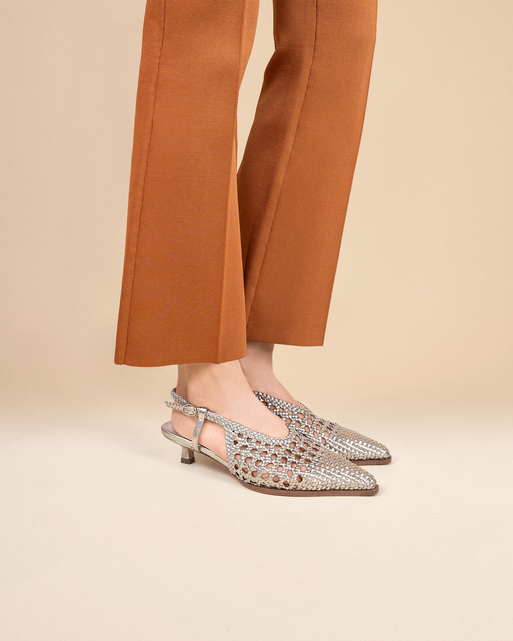 Marina Woven Gold woven faux leather slingback pump with a small spool heel
