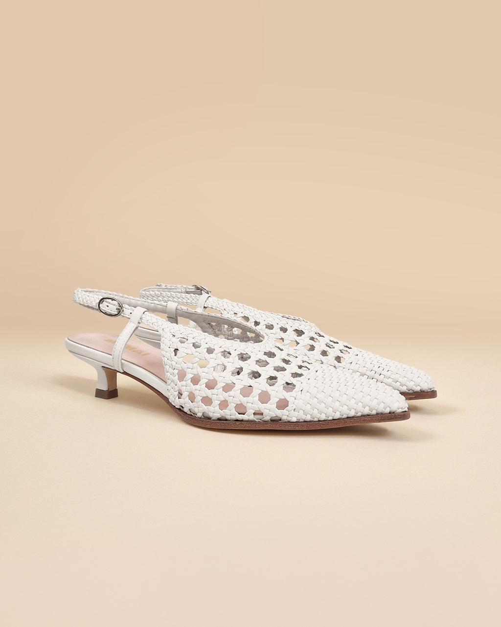 Marina Woven White woven faux leather slingback pump with a small spool heel