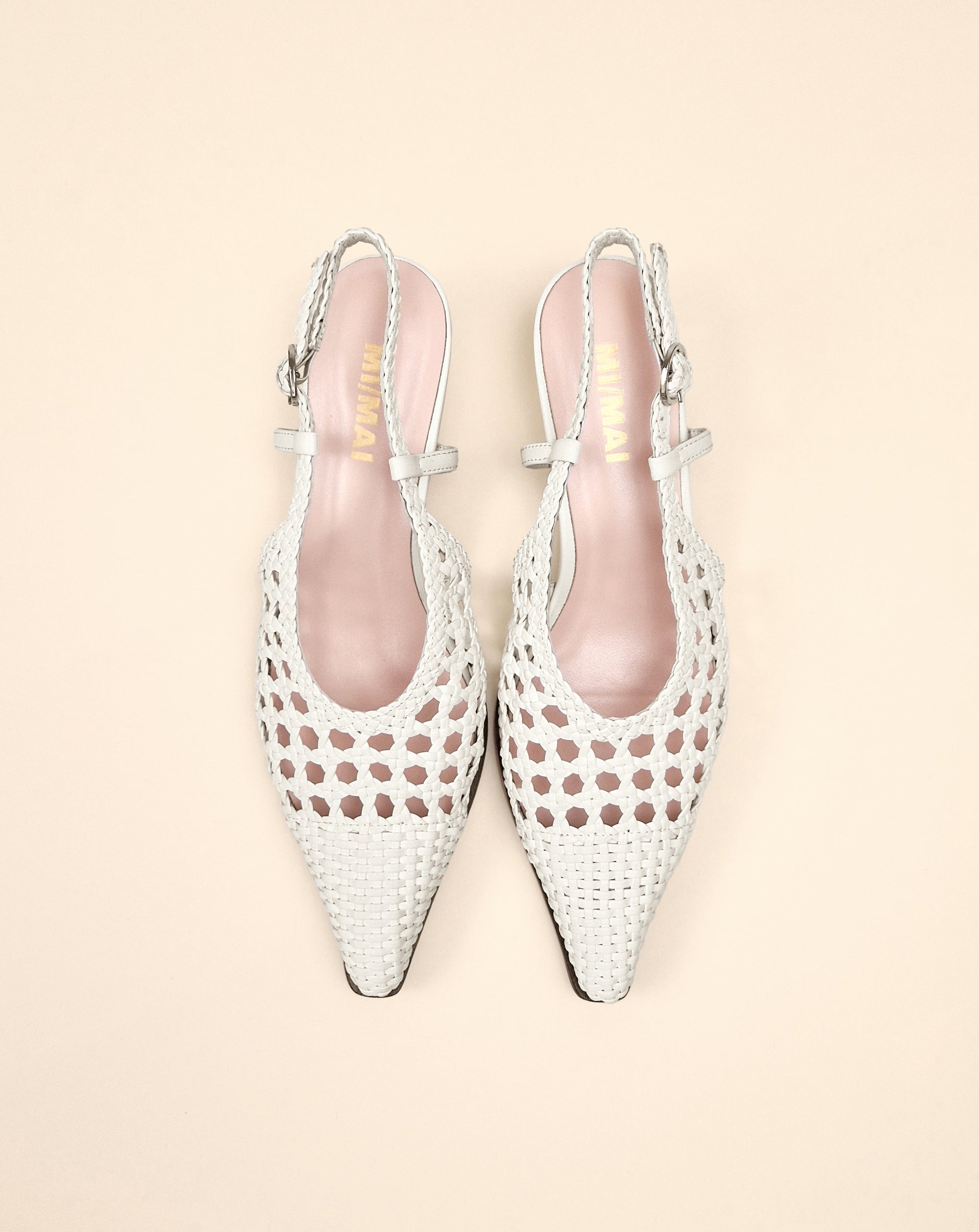 Marina Woven White woven faux leather slingback pump with a small spool heel