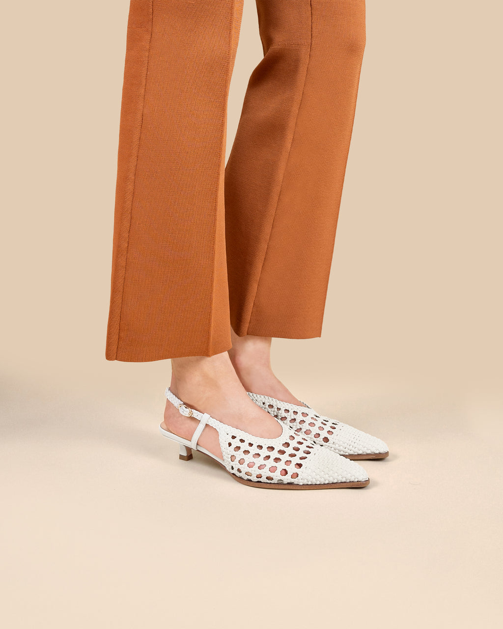 Marina Woven White woven faux leather slingback pump with a small spool heel