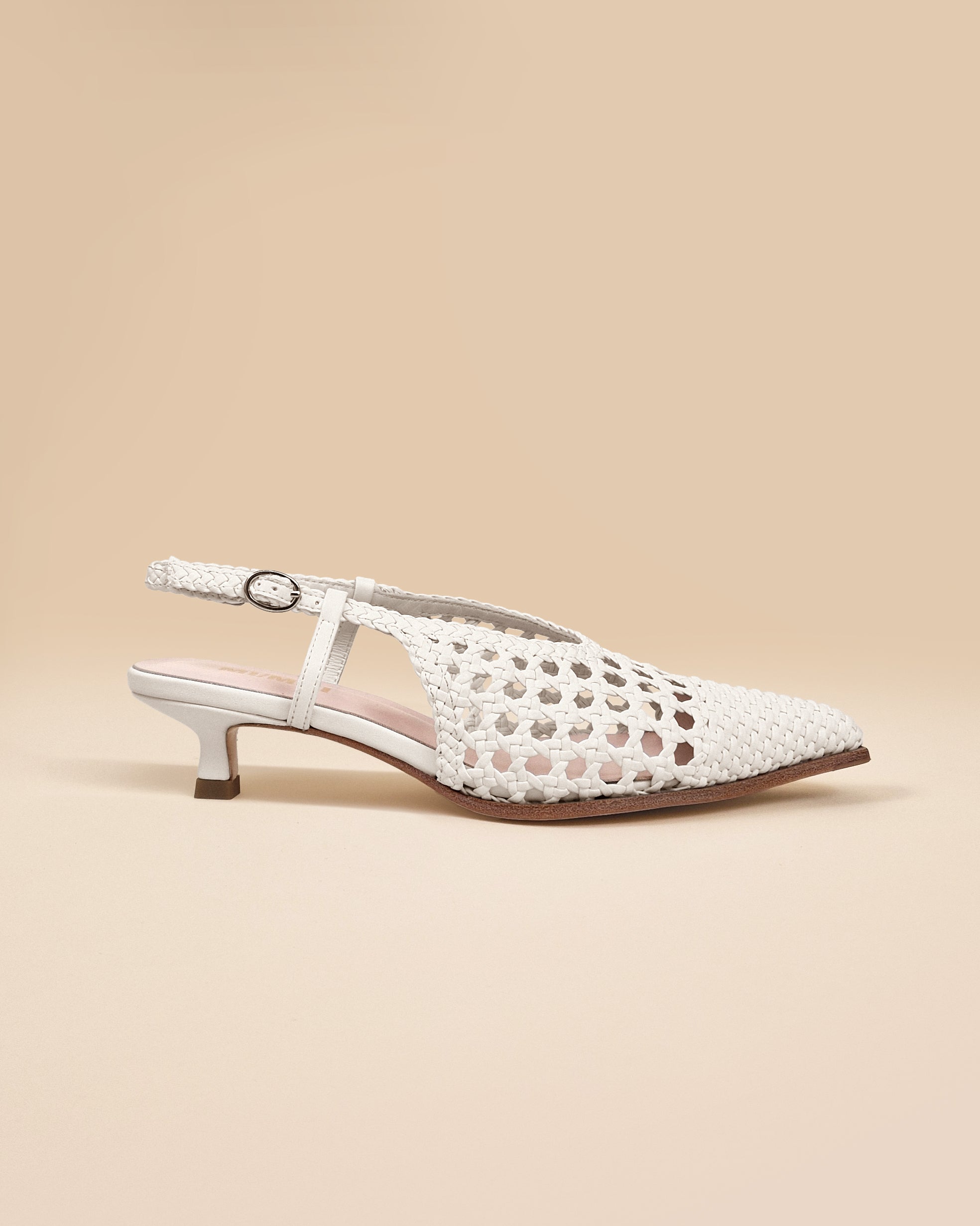Marina Woven White woven faux leather slingback pump with a small spool heel