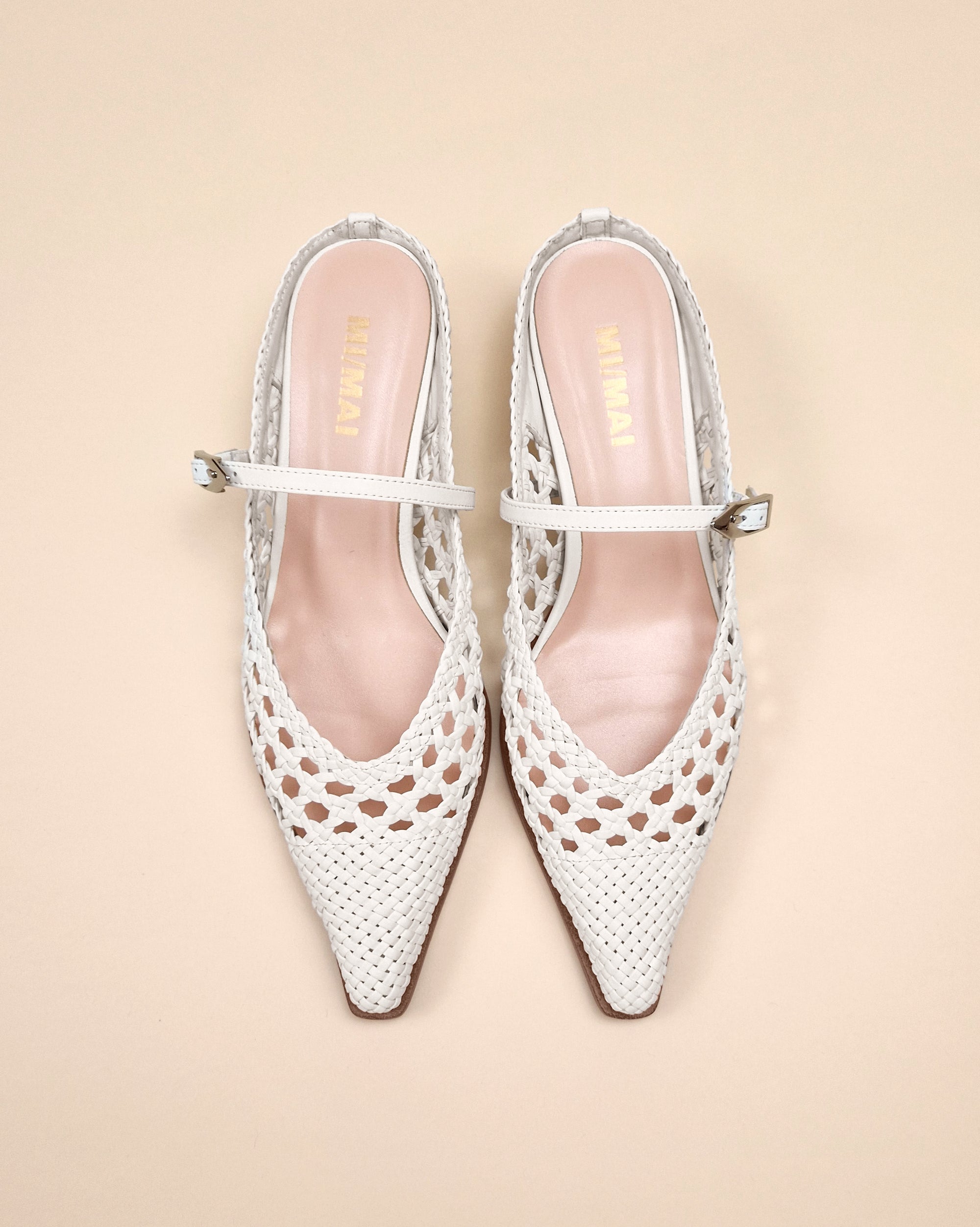 Pointed toe mule pump with small spool heel in white woven faux leather Suzanne Woven White